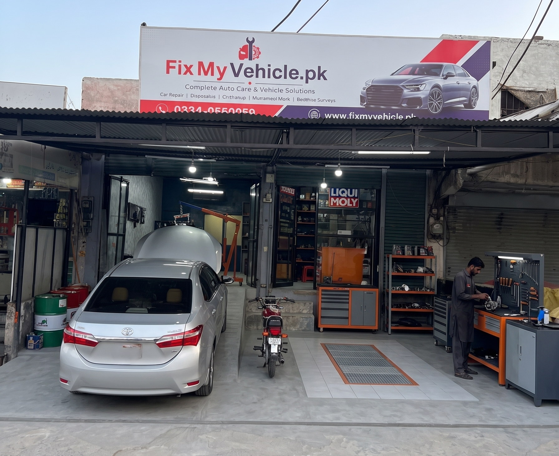 FixMyVehicle workshop exterior and signage at Auto Market I-10/3, Islamabad